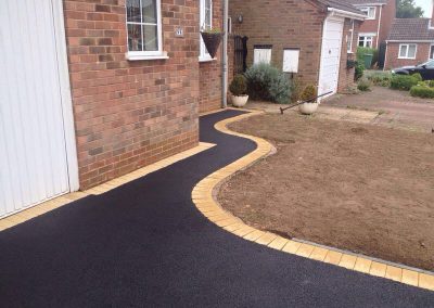 recent installation for a new tarmac driveway